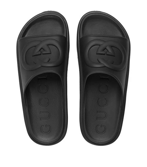 black gucci slides men.